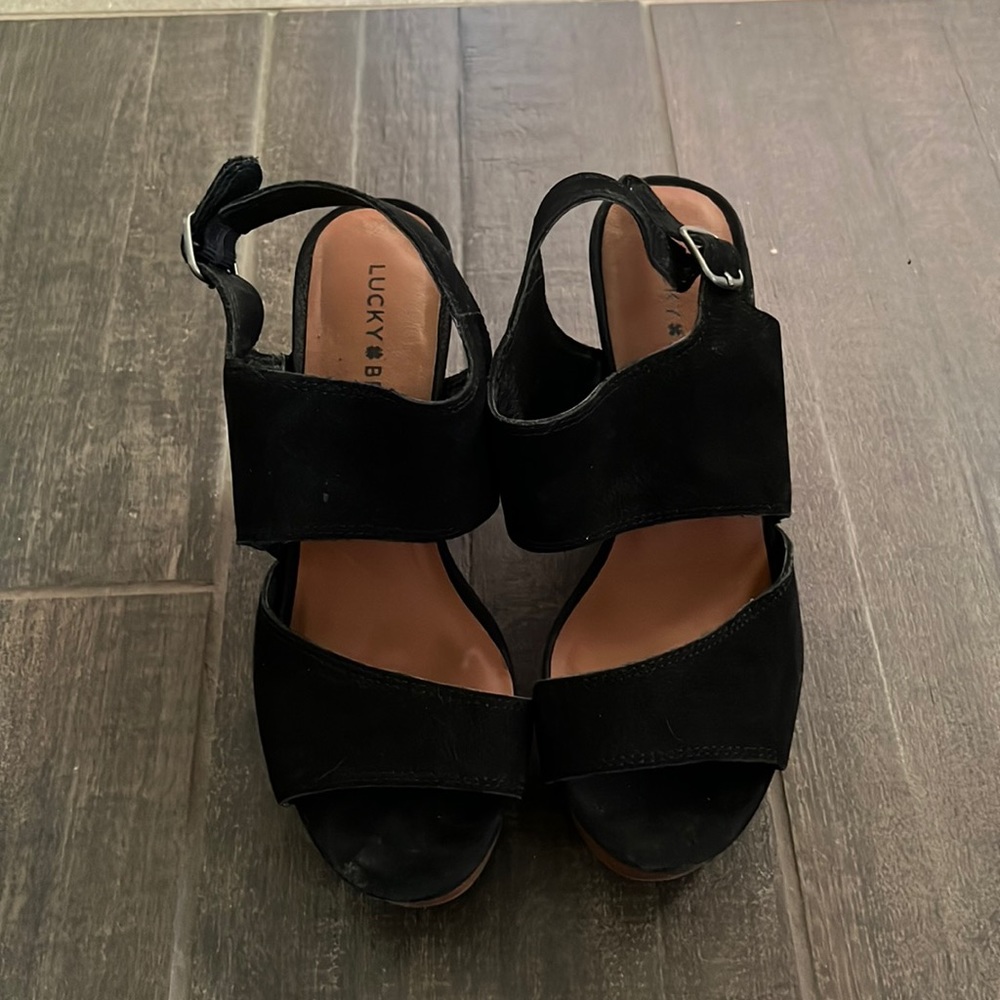 Size 8 black and tan Lucky Brand wedge sandal. Only worn once.